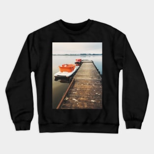 Two Paddleboats Tied to Wooden Pier in Early Morning Light Crewneck Sweatshirt